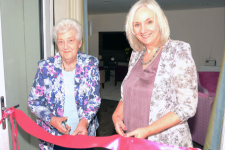 Show apartments open as home nears completion