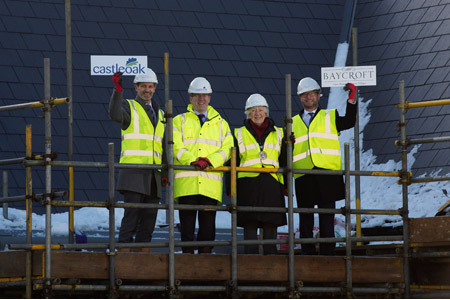 New entrant Baycroft tops out first scheme