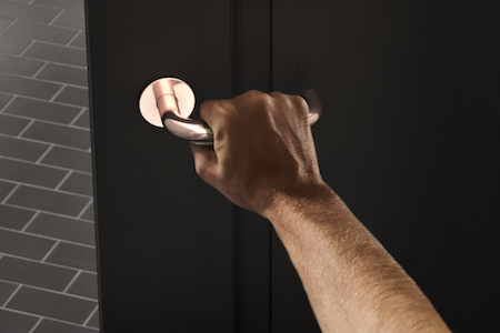 ProEconomy uses a copper touch to handle door furniture 